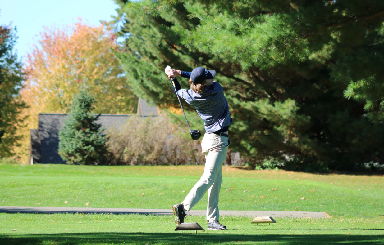 SC4 golfer swinging at a golf ball