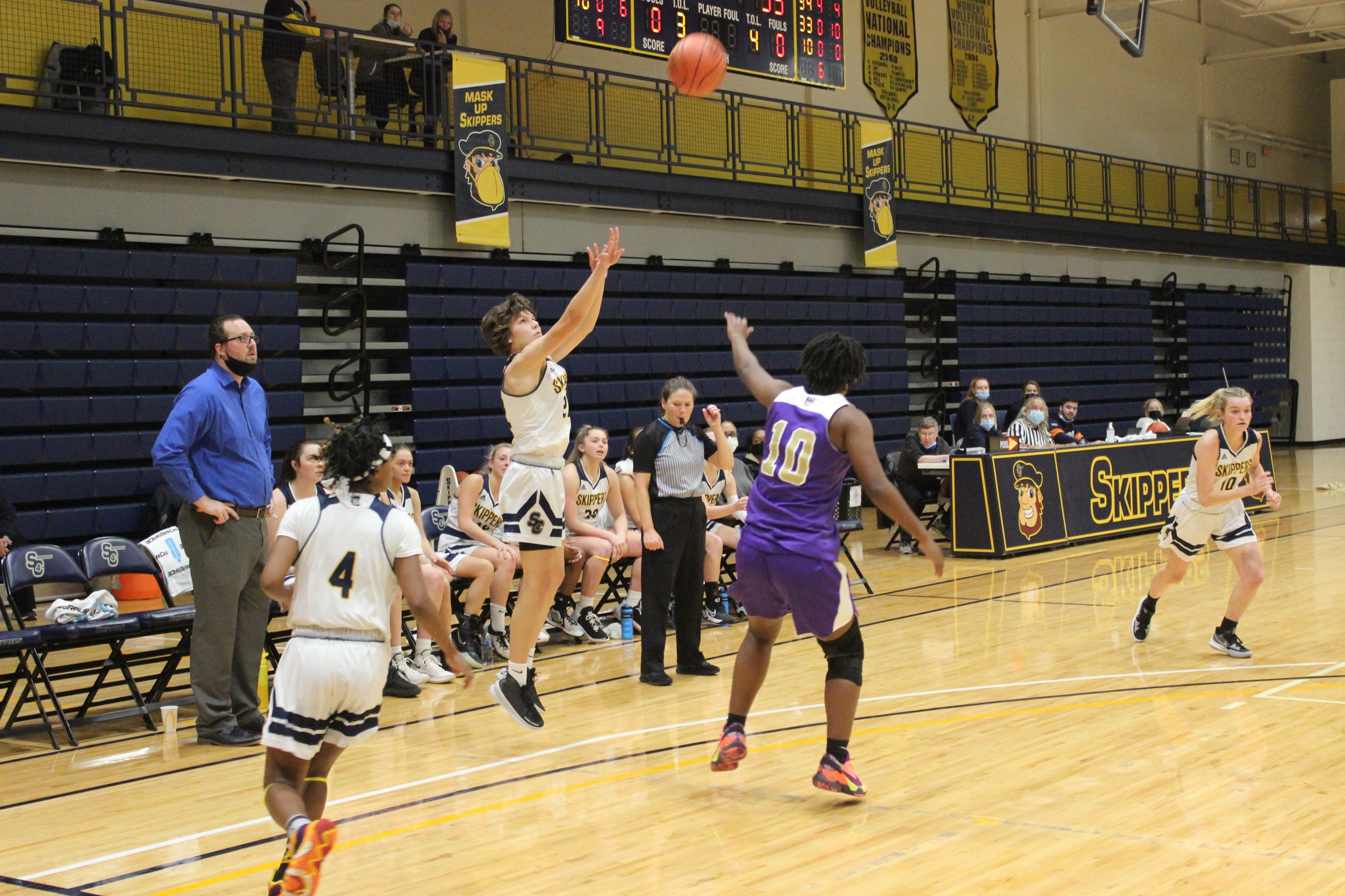 Lily Connelly shoots in game against Albion JV, 11-22-21.